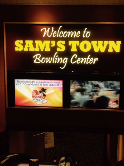 A brightly illuminated sign and side-by-side flat screens greet bowlers and spectators as they descend the escalator from the main floor of Sam's Town to the resort's bowling center.